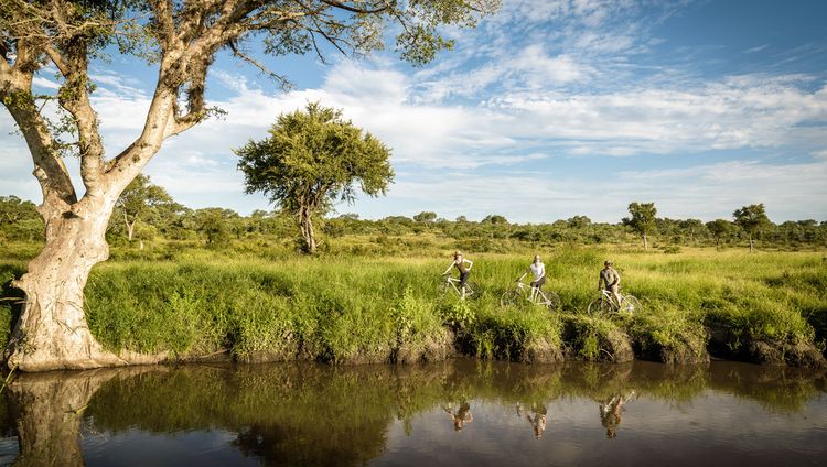 Singita Boulders Lodge - Radeln am Fluß