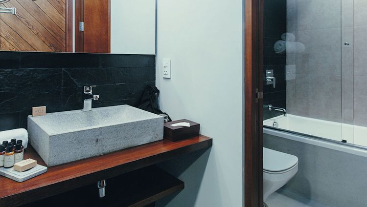 Atix Hotel - Eines der Badezimmer