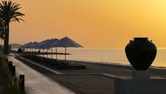The Chedi Muscat - Stand bei Sonnenuntergang